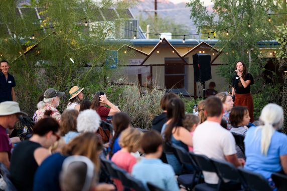 WMG Executive Director Lisa Shipek speaking to a crowd of people at the Beavers & Brews event