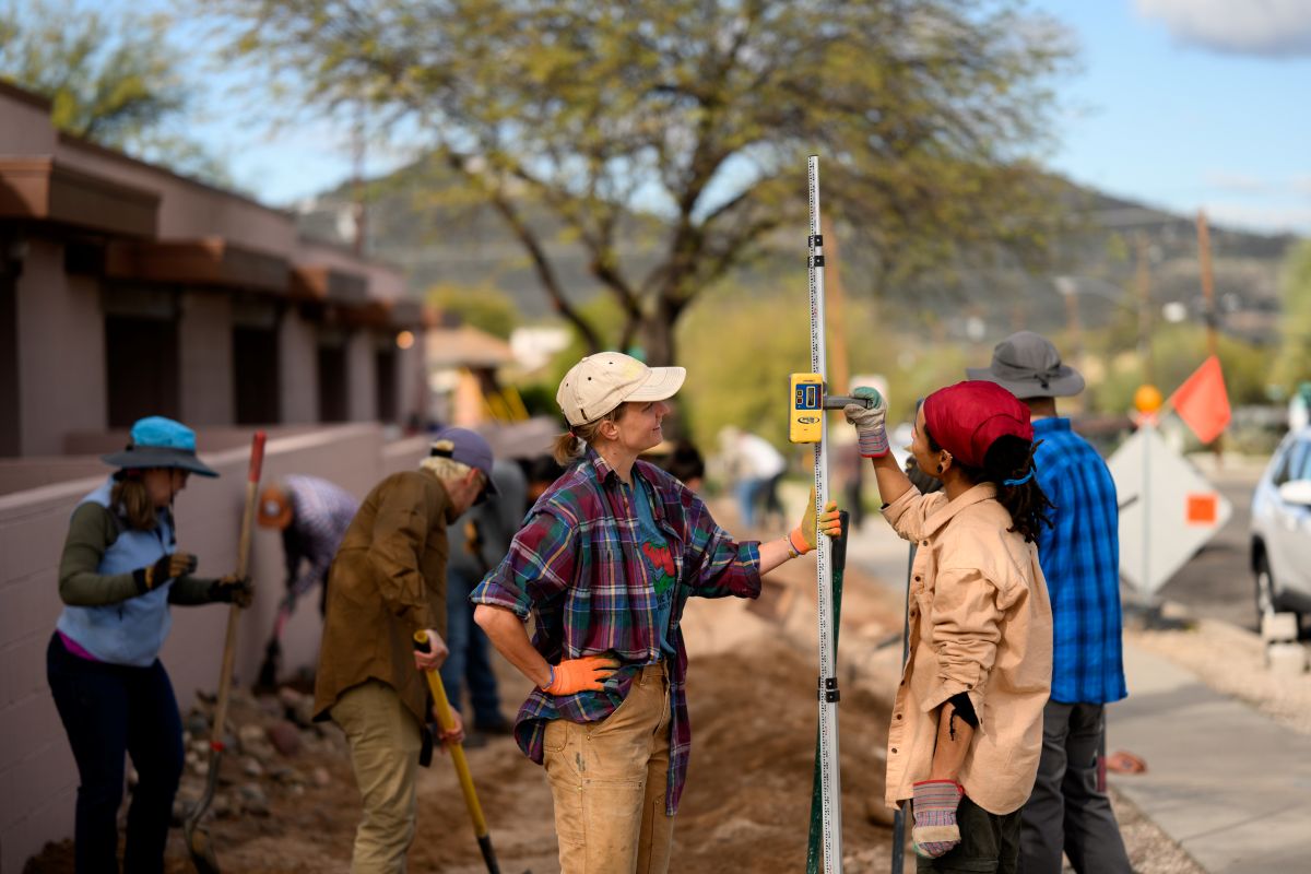 Participants in the Water Harvesting Design Certification Course working in the field